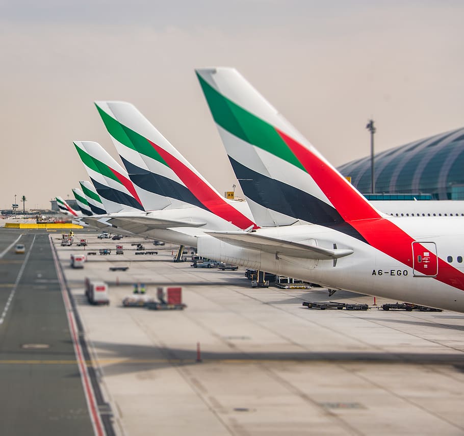 Emirates planes sitting at the Dubai International Airport